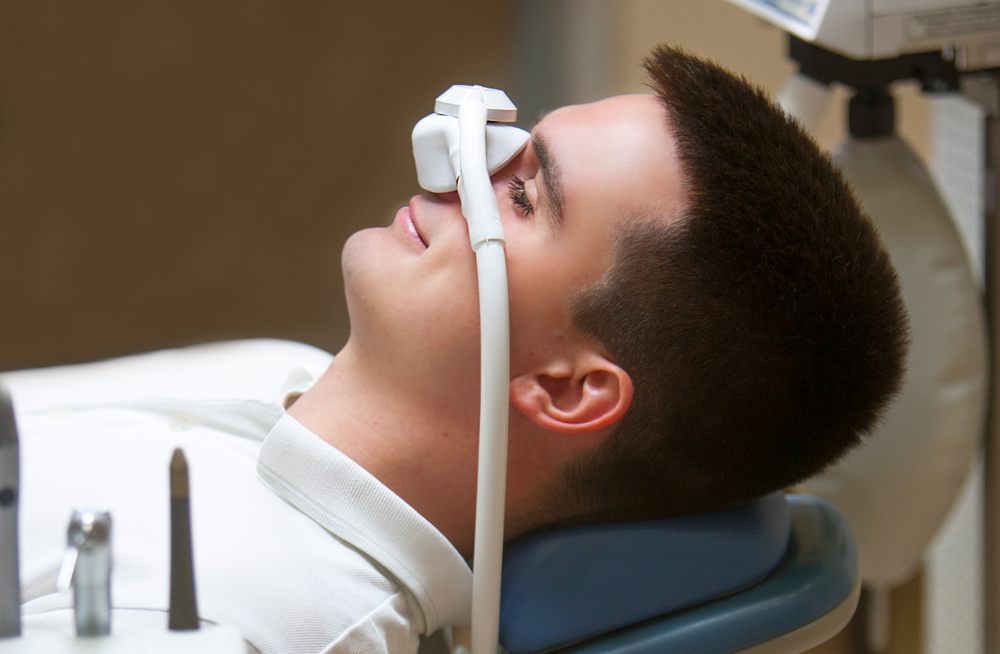 dental patient getting laughing gas sedation