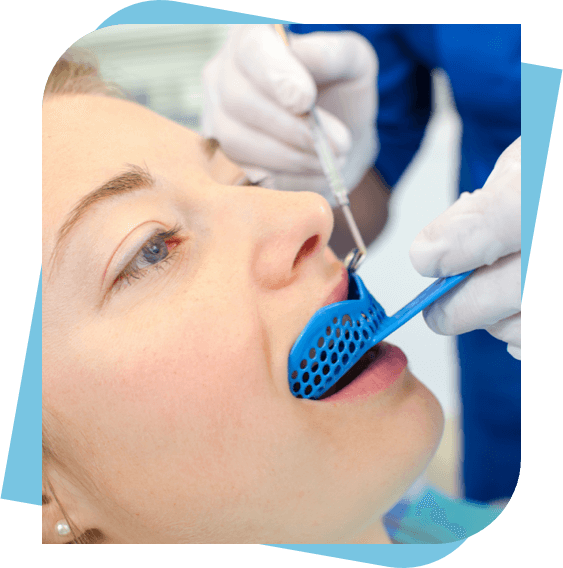 Woman having a mould made for a mouth guard.