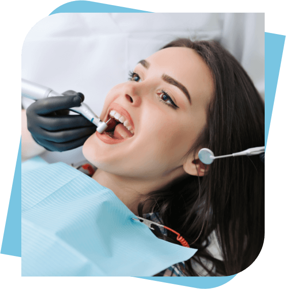 Woman getting work done on her teeth.