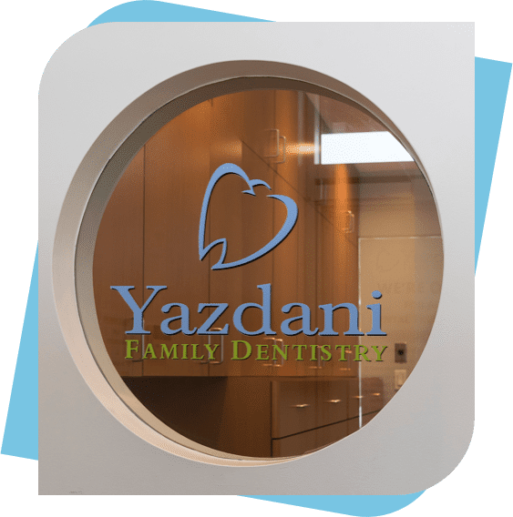 Yazdani Family Dentistry Logo on glass at the Kanata clinic