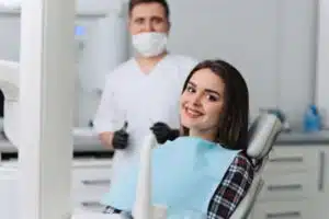 woman smiling before getting dental checkup